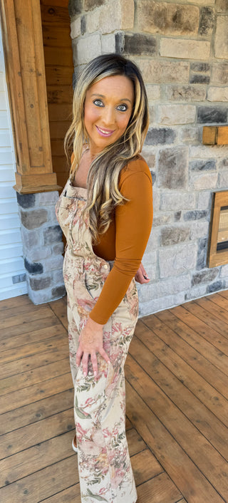 tan overalls with rose and olive green floral pattern