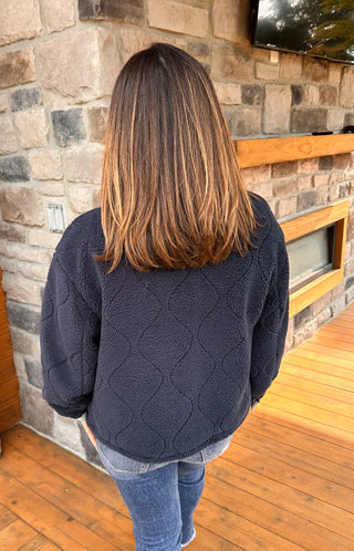 Navy blue sherpa jacket with denim trim