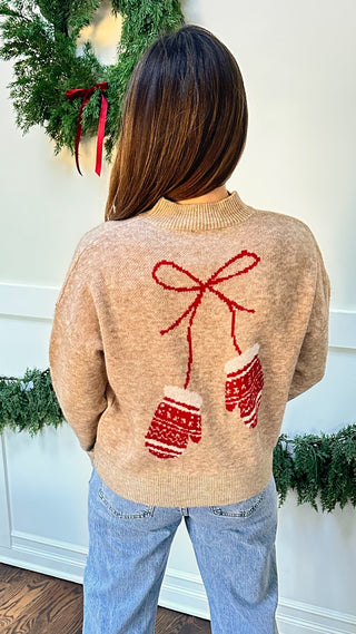 Women’s oat sweater with red mittens detail, front chest and large back graphic