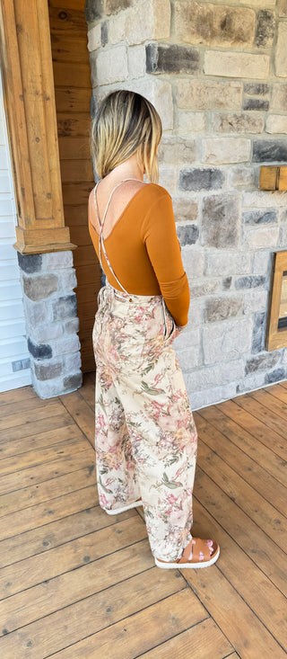 tan overalls with rose and olive green floral pattern