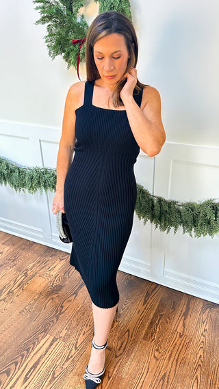 Ribbed black midi dress with flattering rib variation