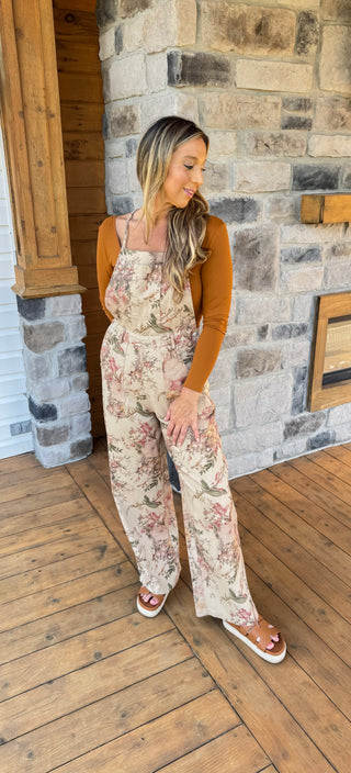 tan overalls with rose and olive green floral pattern