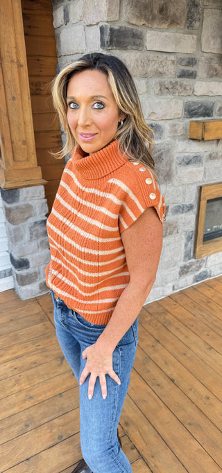 orange and tan striped cable sweater turtleneck vest with gold buttons at shoulder