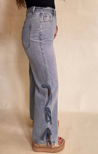 High waisted denim with bow detail at sides