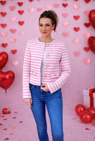 The Pink Lady Jacket featuring classic pink stripes and gold buttons
