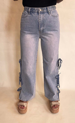 High waisted denim with bow detail at sides