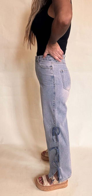 High waisted denim with bow detail at sides